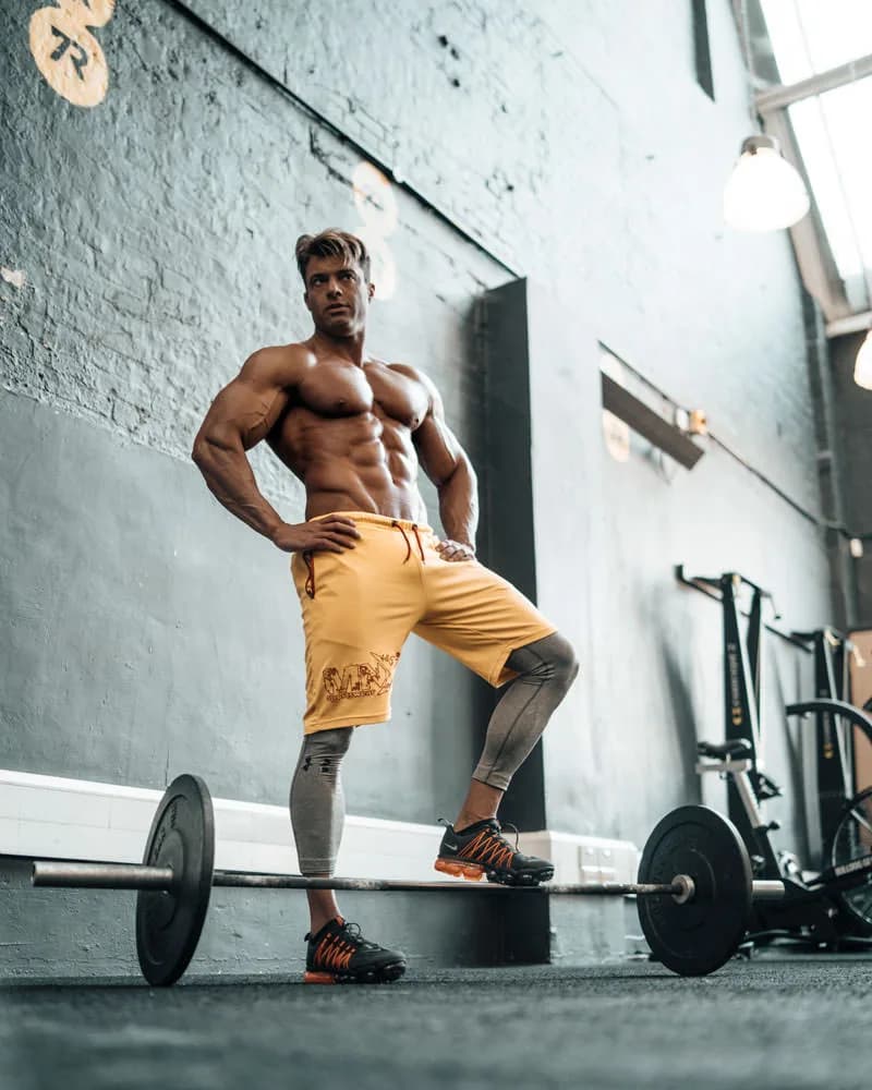 Fitness posing guidance during photoshoot session