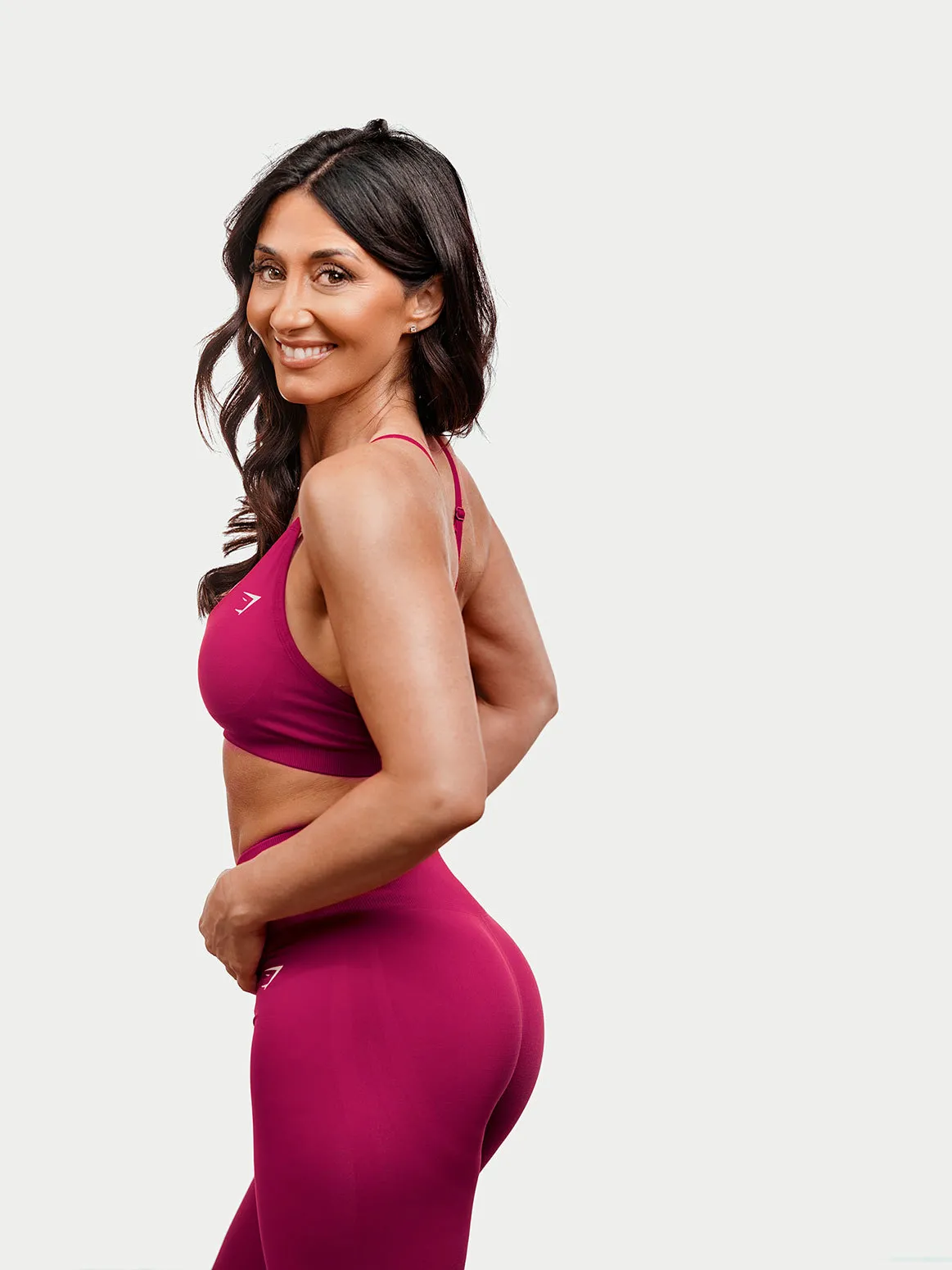 Female fitness coach in Gymshark activewear - PT branding photography