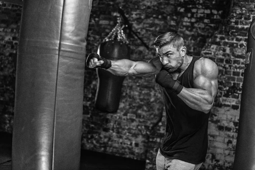 Classic bodybuilding pose with professional lighting