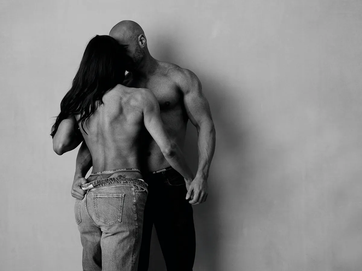 Fitness couple photographed together in styled studio session