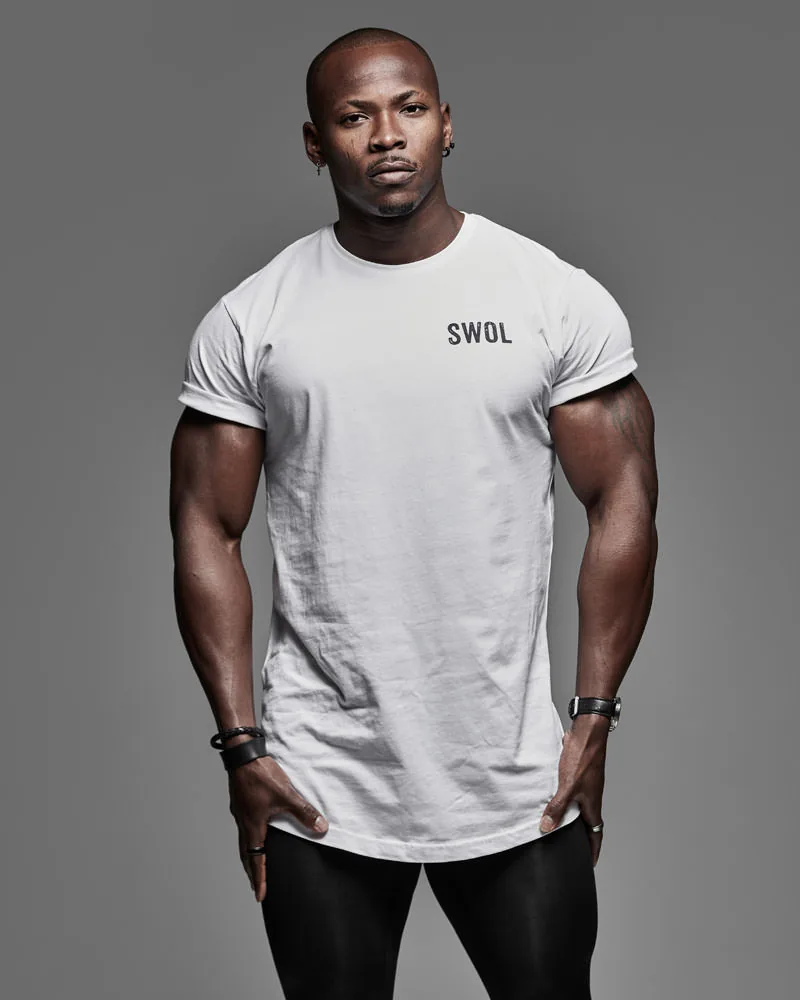 Gym photography showcasing physique and equipment