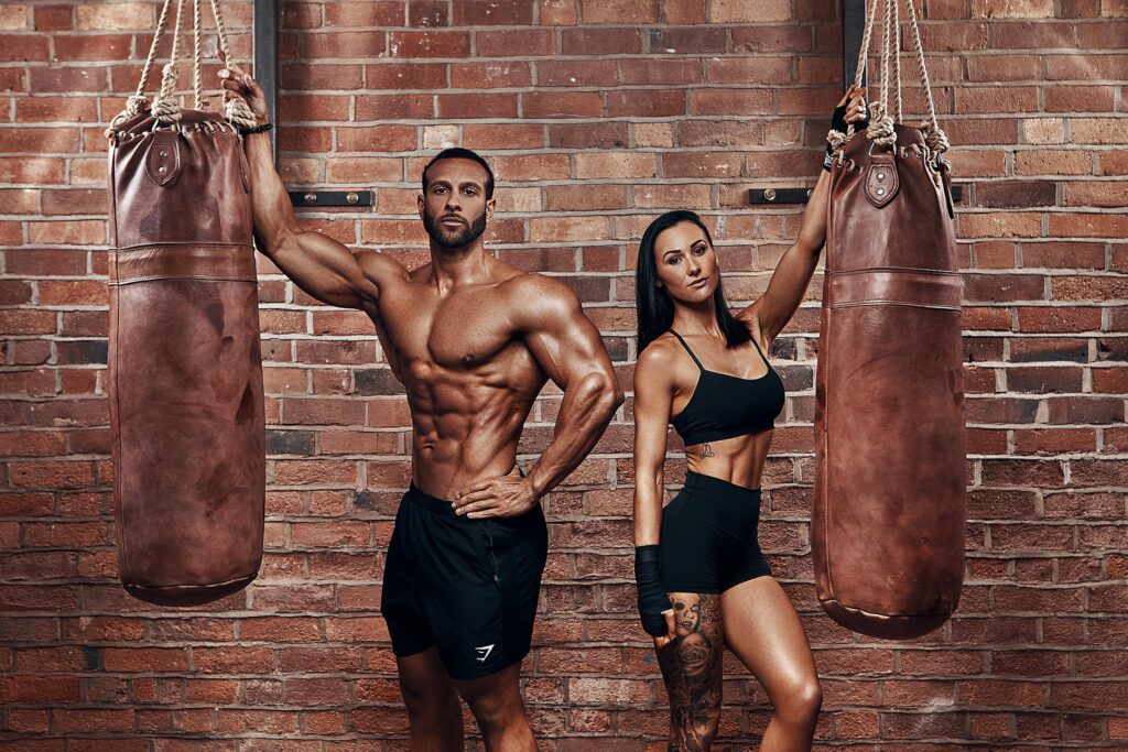 Lisa Fiitt and Romane Lanceford in a fitness photoshoot, exemplifying the results of consistency in training and lifestyle.